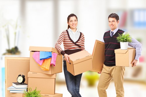 Packed boxes and furniture prepared for truck hire and transport
