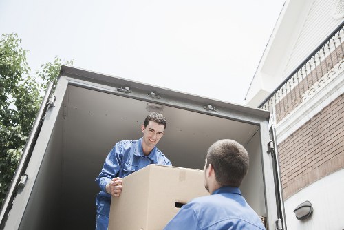 Local packing team organising household items room by room during a Kentish Town move