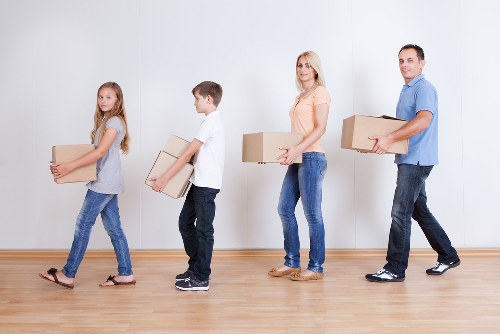 Removals team handling a residential move near Kentish Town streets